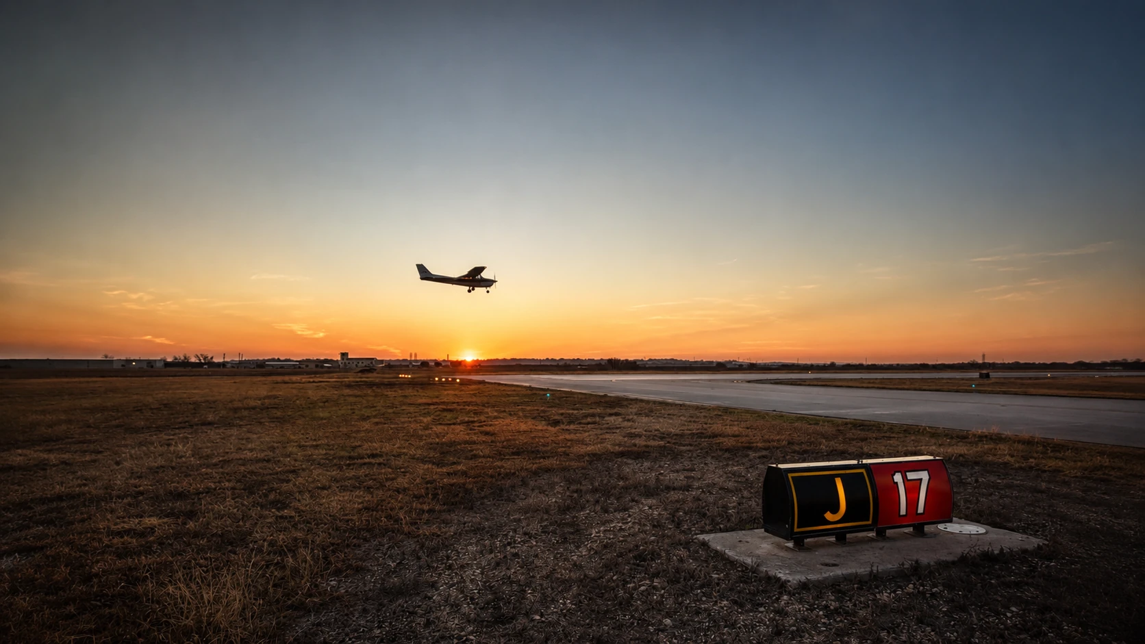 Aircraft landing at San Marcos Regional Airport at sunset